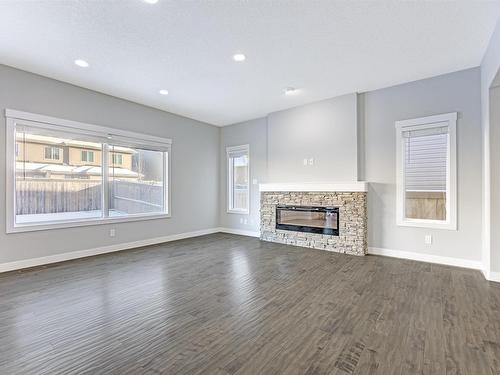 615 176 Street Sw, Edmonton, AB - Indoor Photo Showing Living Room With Fireplace