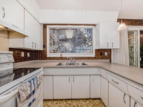 4912 116 Street, Edmonton, AB - Indoor Photo Showing Kitchen With Double Sink