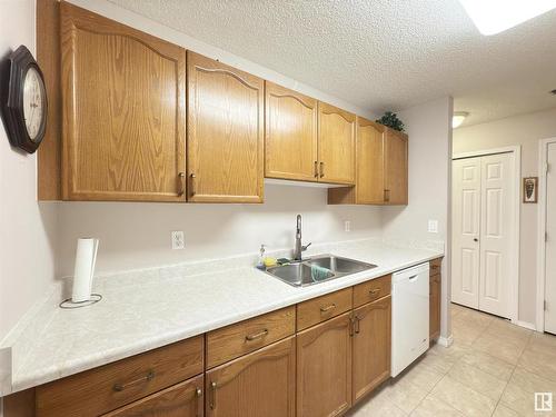 103 17511 98A Avenue, Edmonton, AB - Indoor Photo Showing Kitchen With Double Sink