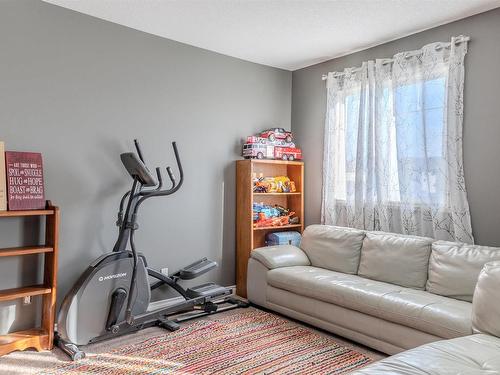 76 Dalquist Bay, Leduc, AB - Indoor Photo Showing Gym Room