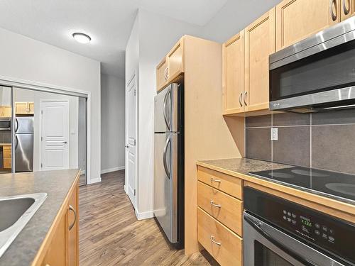 442 4827 104A Street, Edmonton, AB - Indoor Photo Showing Kitchen With Stainless Steel Kitchen