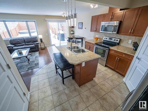 21720 99A Avenue, Edmonton, AB - Indoor Photo Showing Kitchen With Double Sink