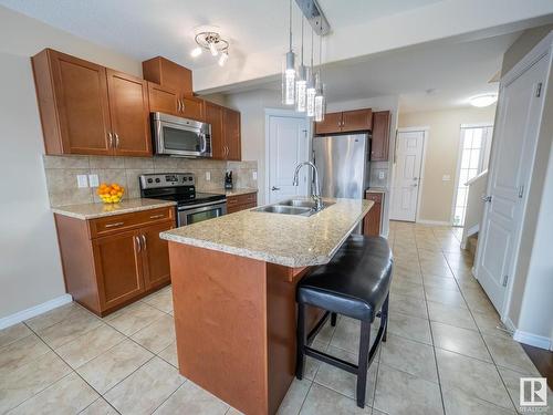 21720 99A Avenue, Edmonton, AB - Indoor Photo Showing Kitchen With Double Sink