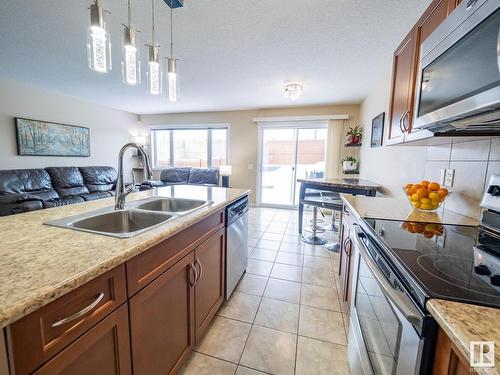 21720 99A Avenue, Edmonton, AB - Indoor Photo Showing Kitchen With Double Sink