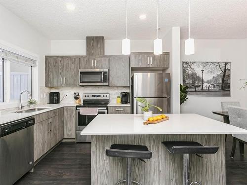 9 2215 24 Street, Edmonton, AB - Indoor Photo Showing Kitchen With Stainless Steel Kitchen With Double Sink With Upgraded Kitchen