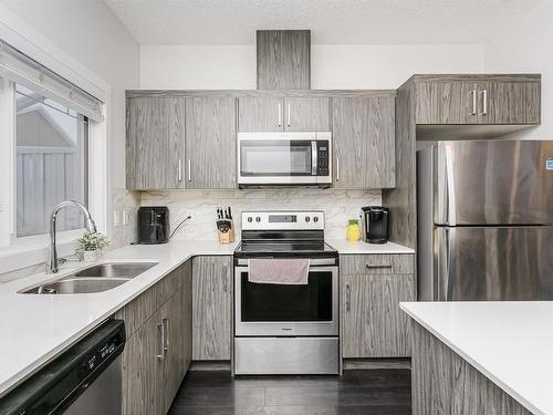 9 2215 24 Street, Edmonton, AB - Indoor Photo Showing Kitchen With Stainless Steel Kitchen With Double Sink With Upgraded Kitchen