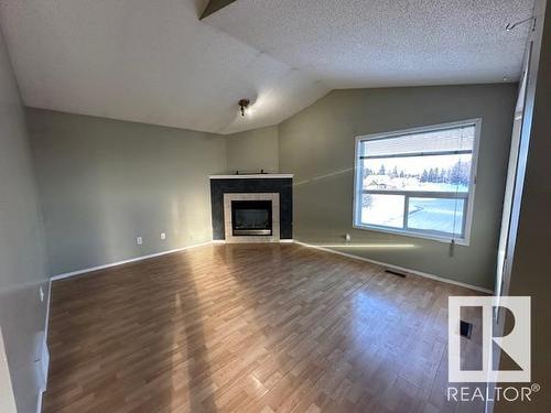 12707 136 Street, Edmonton, AB - Indoor Photo Showing Living Room With Fireplace