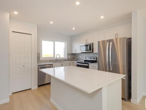 2456 Trumpeter Way, Edmonton, AB - Indoor Photo Showing Kitchen With Stainless Steel Kitchen With Upgraded Kitchen