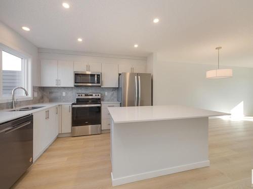 2456 Trumpeter Way, Edmonton, AB - Indoor Photo Showing Kitchen With Stainless Steel Kitchen With Double Sink With Upgraded Kitchen