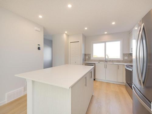 2456 Trumpeter Way, Edmonton, AB - Indoor Photo Showing Kitchen With Stainless Steel Kitchen