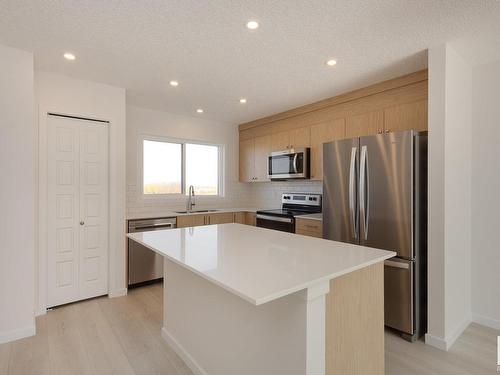 2448 Trumpeter Way, Edmonton, AB - Indoor Photo Showing Kitchen With Stainless Steel Kitchen With Upgraded Kitchen