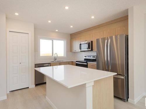 2454 Trumpeter Way, Edmonton, AB - Indoor Photo Showing Kitchen With Stainless Steel Kitchen With Upgraded Kitchen