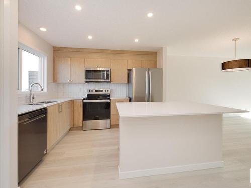 2454 Trumpeter Way, Edmonton, AB - Indoor Photo Showing Kitchen With Stainless Steel Kitchen With Double Sink With Upgraded Kitchen