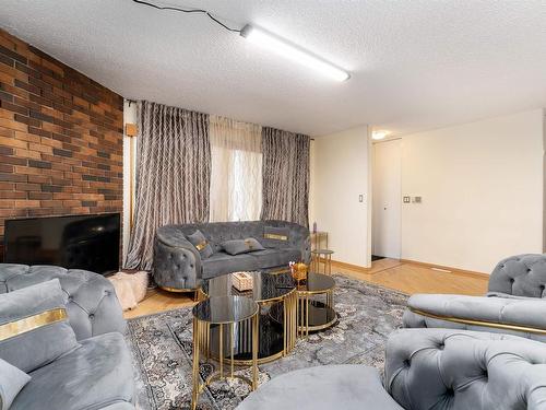 14511 117 Street, Edmonton, AB - Indoor Photo Showing Living Room With Fireplace