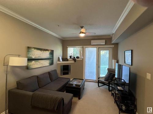 120 10121 80 Avenue, Edmonton, AB - Indoor Photo Showing Living Room