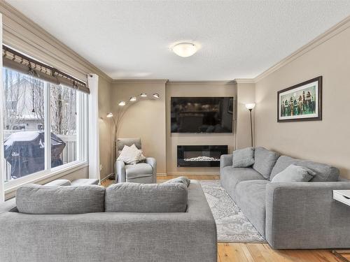 6914 19A Avenue, Edmonton, AB - Indoor Photo Showing Living Room With Fireplace