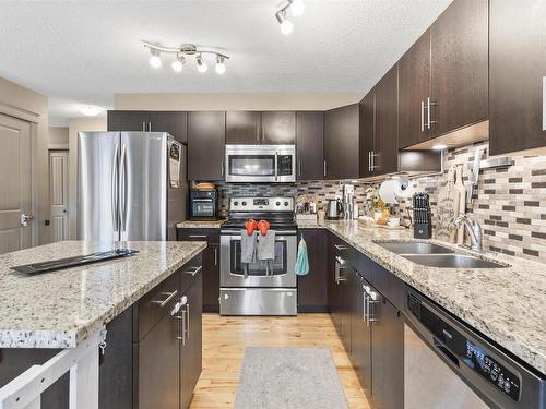 6914 19A Avenue, Edmonton, AB - Indoor Photo Showing Kitchen With Stainless Steel Kitchen With Double Sink With Upgraded Kitchen