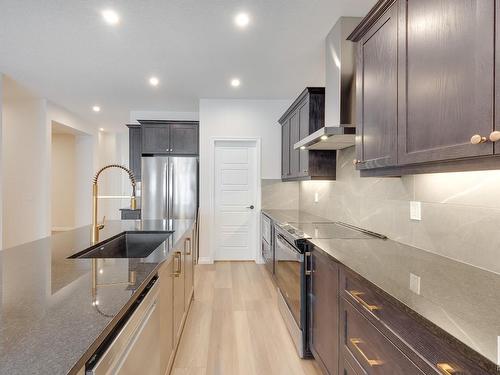 177 Stonehouse Way, Leduc, AB - Indoor Photo Showing Kitchen With Stainless Steel Kitchen With Upgraded Kitchen