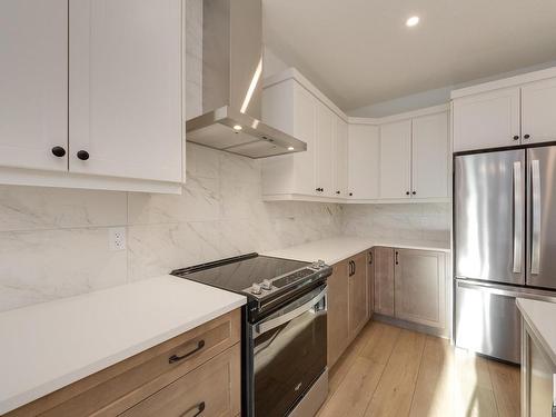 179 Stonehouse Way, Leduc, AB - Indoor Photo Showing Kitchen With Stainless Steel Kitchen