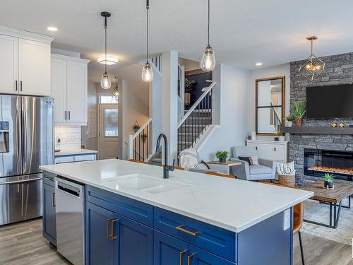 4658 Alwood Way, Edmonton, AB - Indoor Photo Showing Kitchen With Fireplace With Stainless Steel Kitchen With Upgraded Kitchen