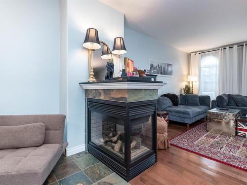 4947 Terwillegar Common, Edmonton, AB - Indoor Photo Showing Living Room With Fireplace