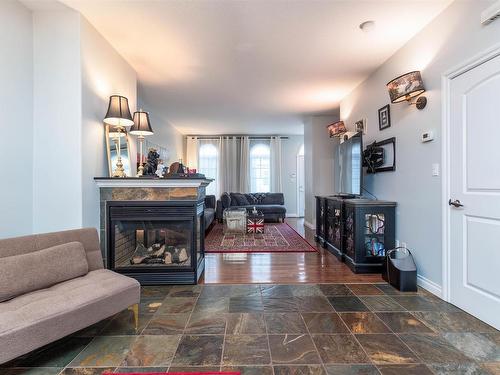 4947 Terwillegar Common, Edmonton, AB - Indoor Photo Showing Living Room With Fireplace