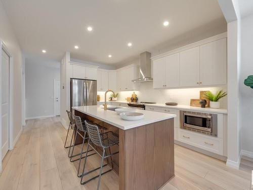 166 Stonehouse Way, Leduc, AB - Indoor Photo Showing Kitchen With Stainless Steel Kitchen With Upgraded Kitchen