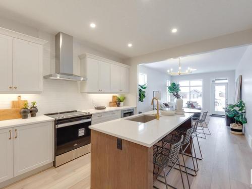 166 Stonehouse Way, Leduc, AB - Indoor Photo Showing Kitchen With Upgraded Kitchen