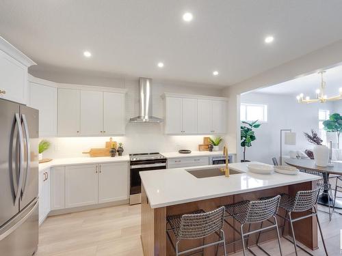 166 Stonehouse Way, Leduc, AB - Indoor Photo Showing Kitchen With Stainless Steel Kitchen With Upgraded Kitchen