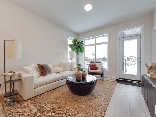 166 Stonehouse Way, Leduc, AB - Indoor Photo Showing Living Room