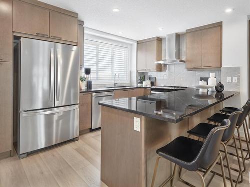 118 Stiles Bend, Leduc, AB - Indoor Photo Showing Kitchen With Stainless Steel Kitchen