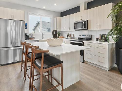 120 Stiles Bend, Leduc, AB - Indoor Photo Showing Kitchen With Stainless Steel Kitchen With Upgraded Kitchen