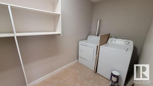 49 13590 38 Street Nw, Edmonton, AB - Indoor Photo Showing Laundry Room