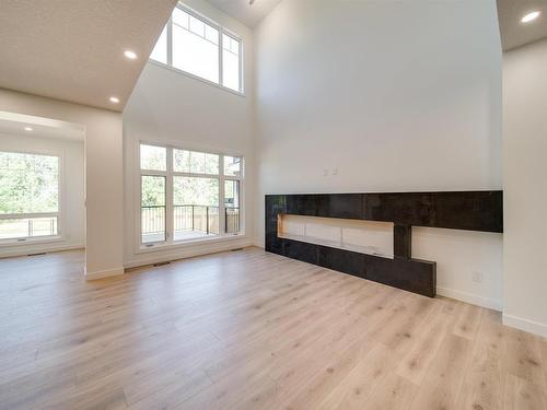 1410 Enright Landing, Edmonton, AB - Indoor Photo Showing Living Room With Fireplace