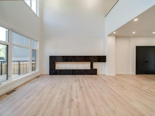 1410 Enright Landing, Edmonton, AB - Indoor Photo Showing Living Room With Fireplace