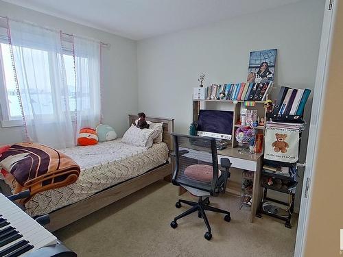 2205 16 Ave, Edmonton, AB - Indoor Photo Showing Bedroom