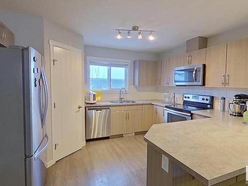 2205 16 Ave, Edmonton, AB - Indoor Photo Showing Kitchen With Stainless Steel Kitchen With Double Sink