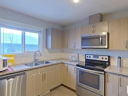 2205 16 Ave, Edmonton, AB - Indoor Photo Showing Kitchen With Stainless Steel Kitchen With Double Sink