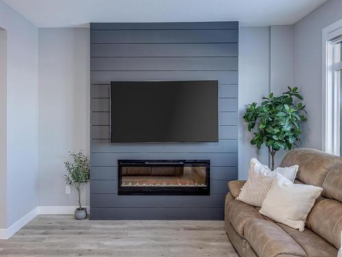 130 804 Welsh Drive, Edmonton, AB - Indoor Photo Showing Living Room With Fireplace