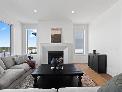 39 Darby Crescent, Spruce Grove, AB - Indoor Photo Showing Living Room With Fireplace