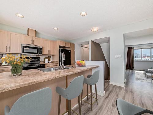 12 Fairfax Lane, Devon, AB - Indoor Photo Showing Kitchen With Double Sink