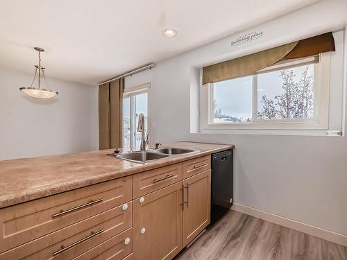 12 Fairfax Lane, Devon, AB - Indoor Photo Showing Kitchen With Double Sink