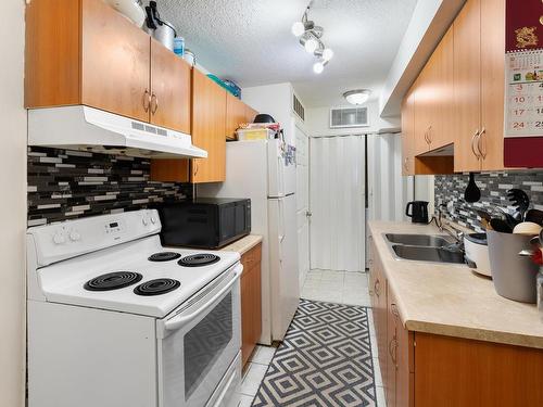 1498 Lakewood Road, Edmonton, AB - Indoor Photo Showing Kitchen With Double Sink