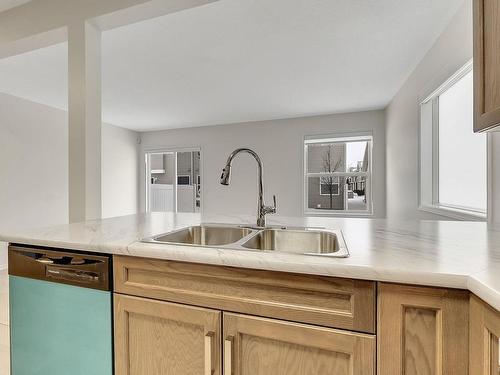 126 150 Edwards Drive, Edmonton, AB - Indoor Photo Showing Kitchen With Double Sink