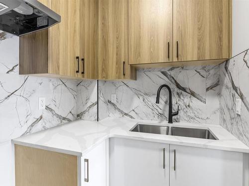 2028 155 Avenue, Edmonton, AB - Indoor Photo Showing Kitchen With Double Sink