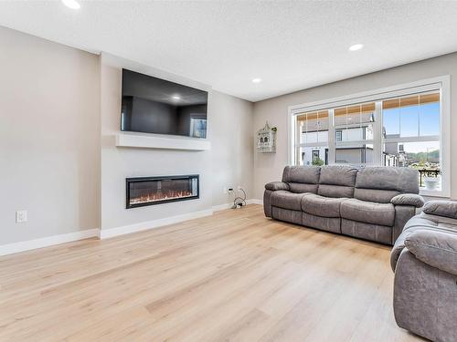 3504 4 Street, Edmonton, AB - Indoor Photo Showing Living Room With Fireplace