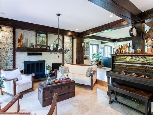 59512 Rge Rd 33, Rural Barrhead County, AB - Indoor Photo Showing Living Room With Fireplace