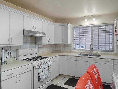 8004 130 Avenue, Edmonton, AB - Indoor Photo Showing Kitchen With Double Sink