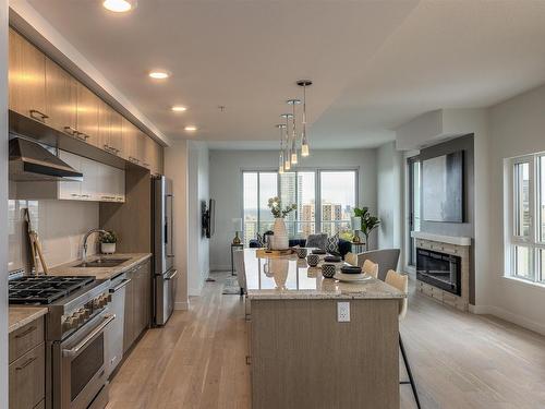 1801 9720 106 Street, Edmonton, AB - Indoor Photo Showing Kitchen With Fireplace With Double Sink With Upgraded Kitchen