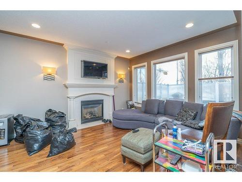 37 1225 Wanyandi Road, Edmonton, AB - Indoor Photo Showing Living Room With Fireplace